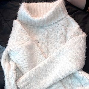This is a cozy soft white cotton sweater, I’ve only wore it a couple times